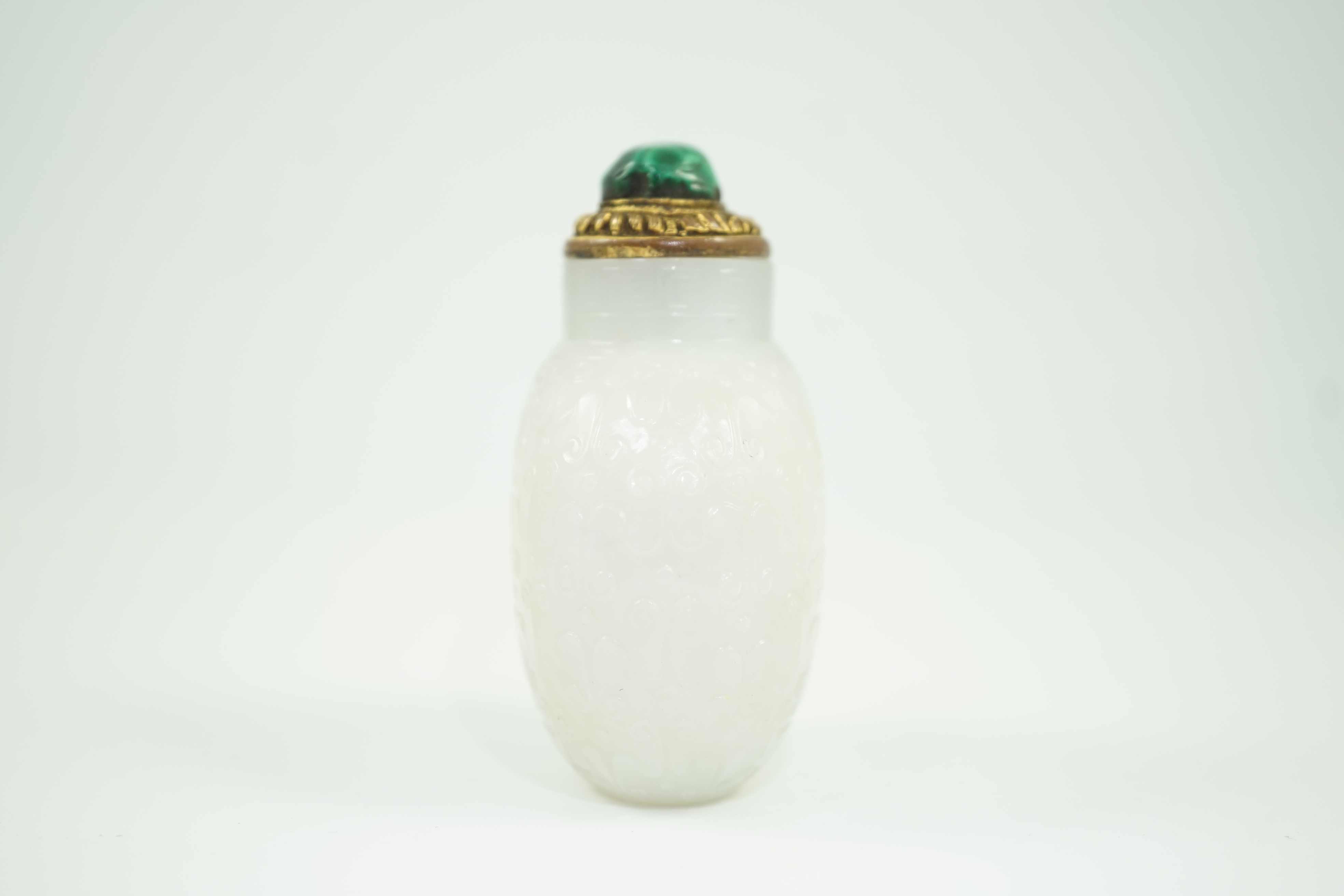 A good Chinese archaistic white jade snuff bottle, 1780-1850